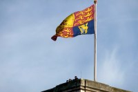 royal standard flag flying over buckingham palace